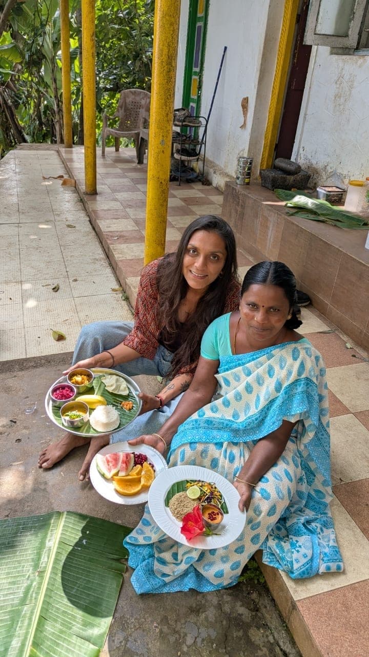 Two of the kitchen sharing a meal at the table