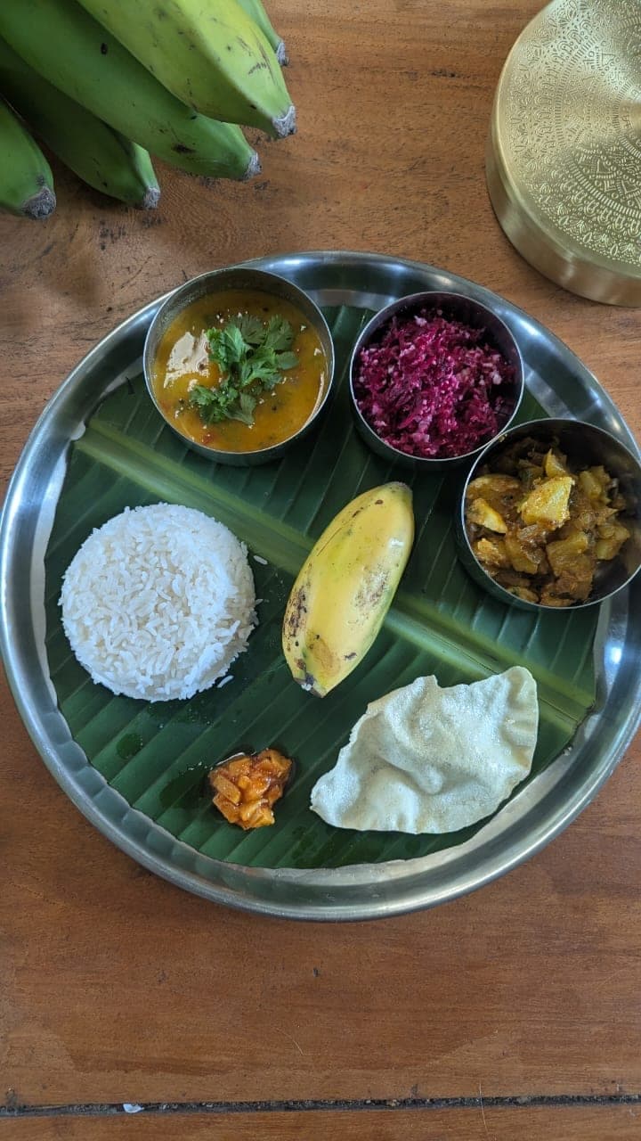 A South Indian thali served on a banana leaf