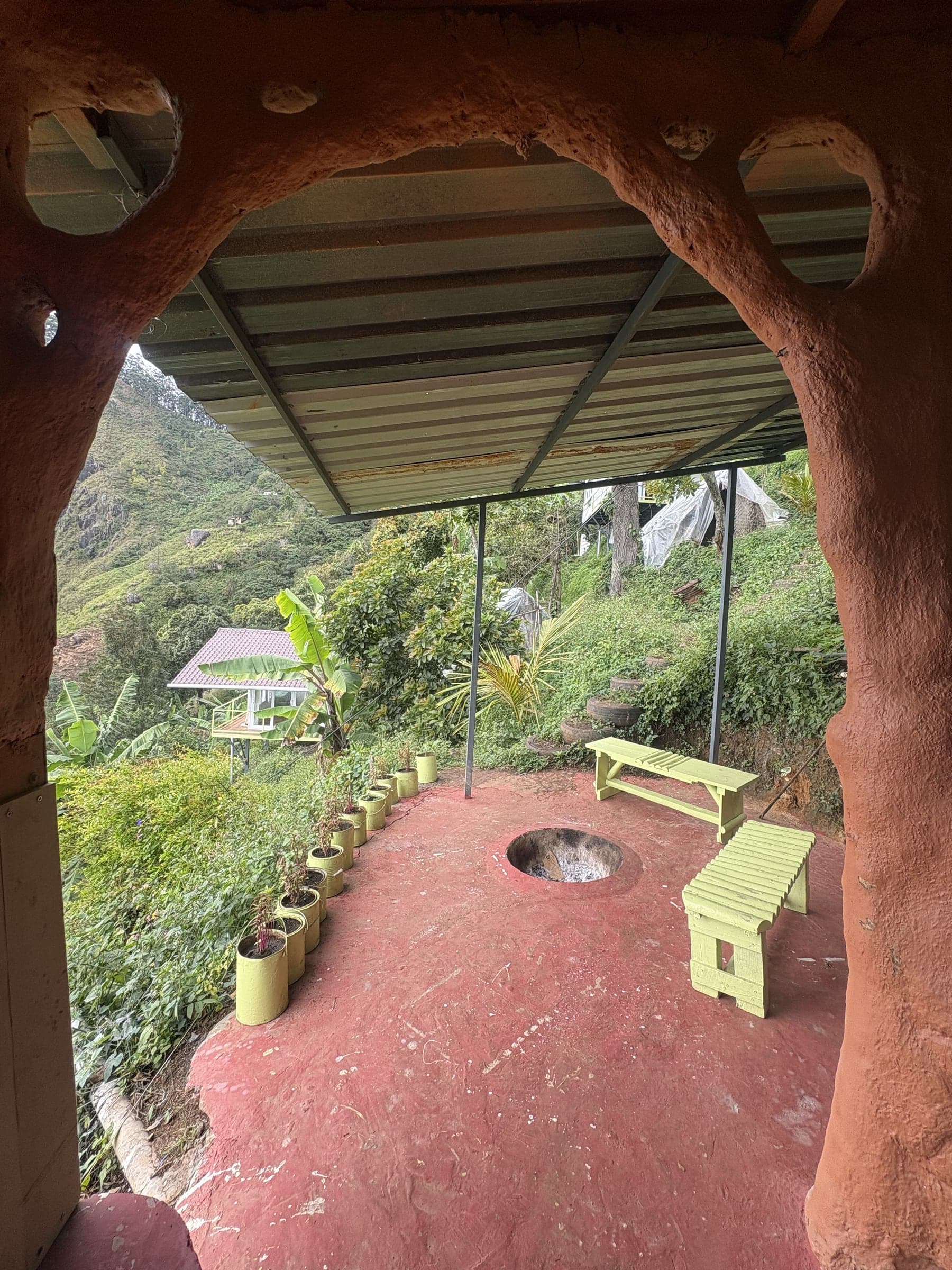 The communal table looking out over the misty hills